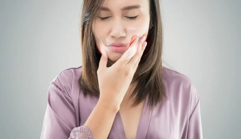 Nguyên nhân bị đau hàm quai hàm khi há miệng