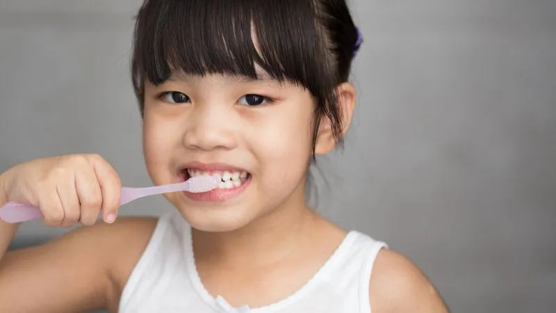 Cách giải quyết hiệu quả việc bé thay răng cửa lâu mọc
